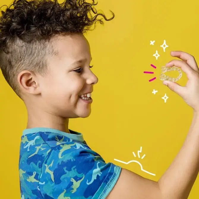 Photo-text-media-boy-holding-invisalign-first-yellow-background